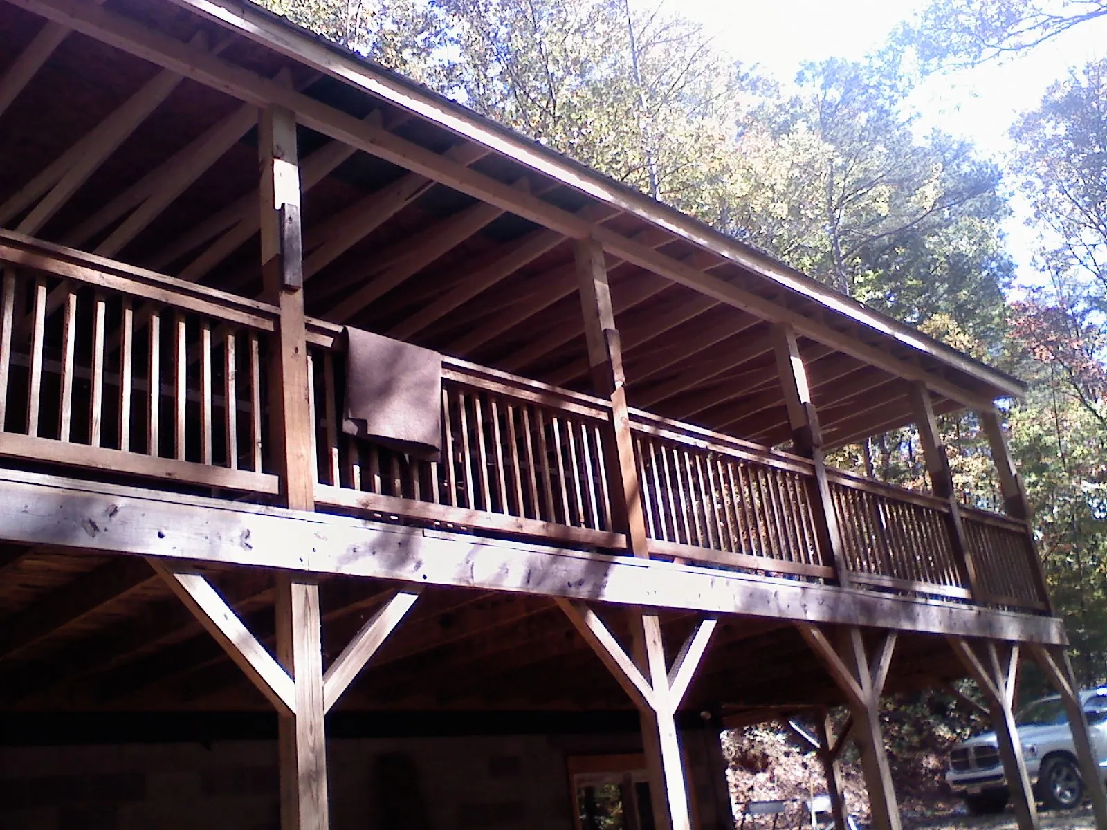 Timber framing under a new elevated porch and deck — Roof Leak Repair in Emigrant by Roofing Brothers